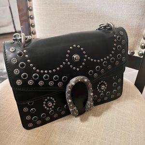 Leather black shoulder purse in good condition.